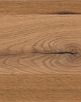 Close-up image of a wood finish sample showcasing the natural grain and color variations of white oak.